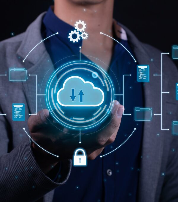 A man employs cloud-based computing on his smartphone to facilitate data transmission and backup.