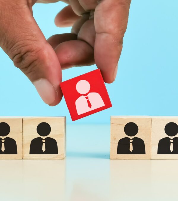 choosing good employee leader. Man choose and take wooden cube.